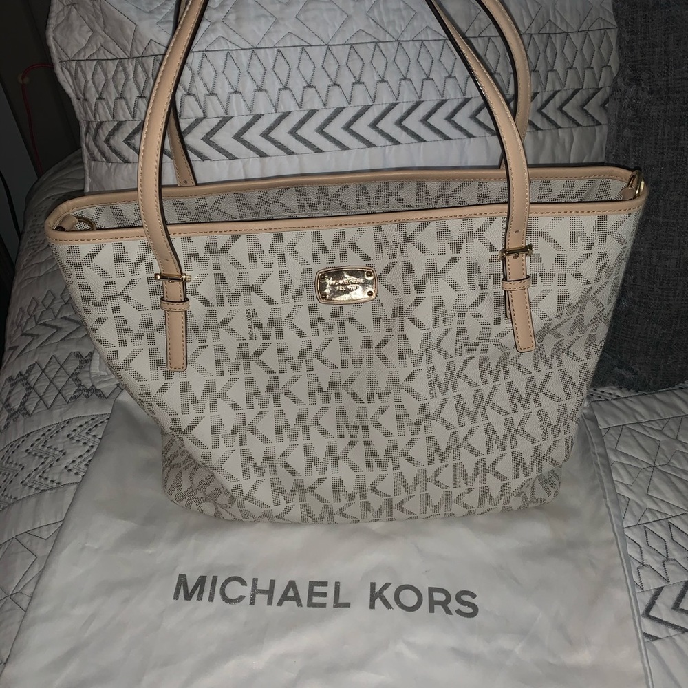 Michael Kors baby changing bag with a mat